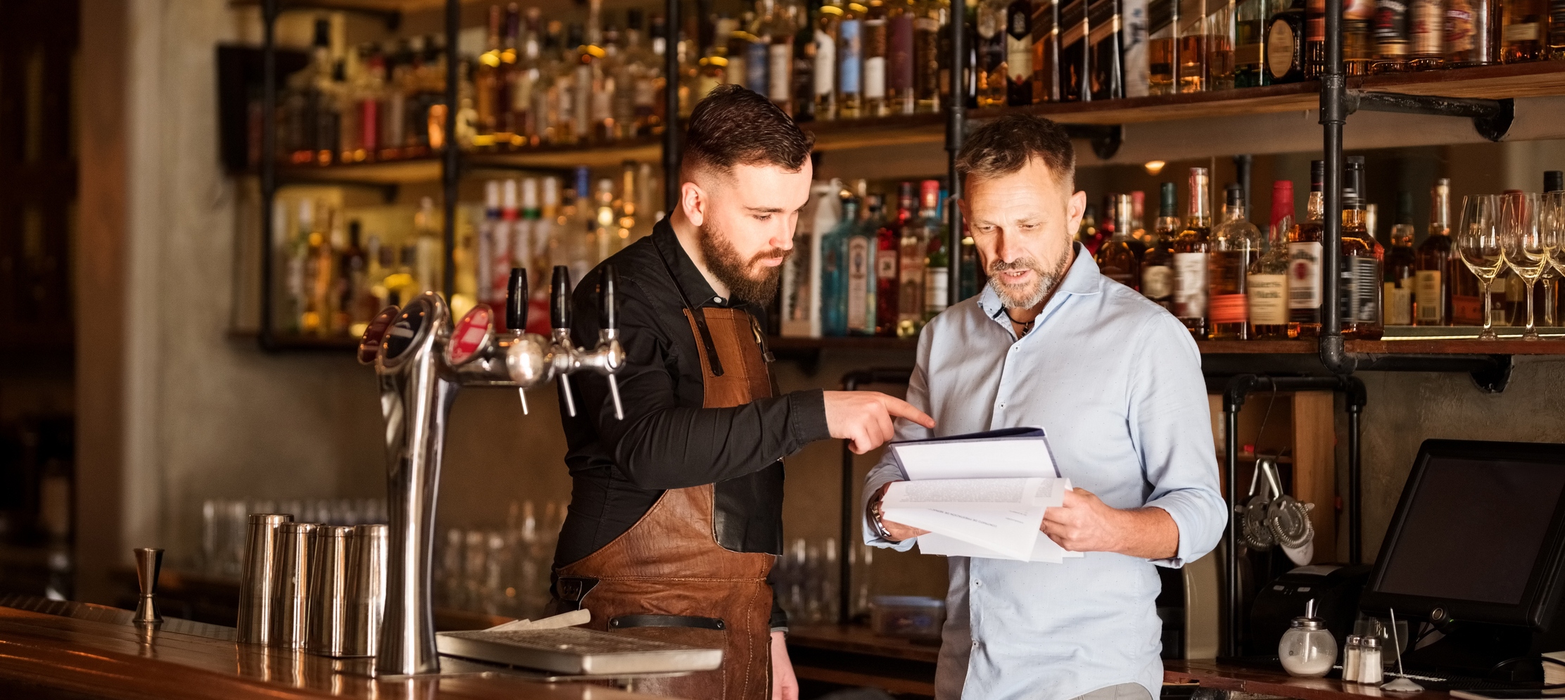 Financial Management for Hospitality Businesses - bar staff discussing budget